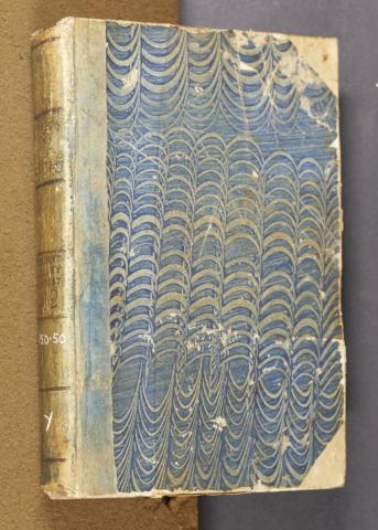 Blue displace-patterned paste paper, left cover (no shelfmark)