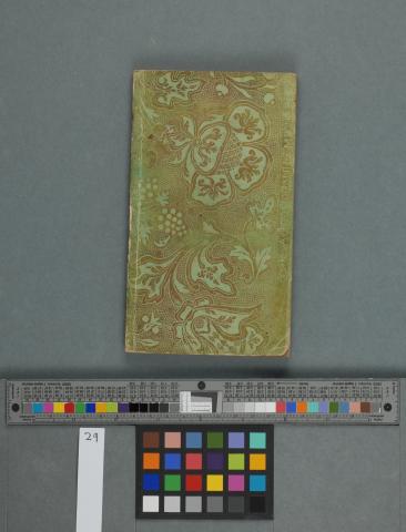 Brocade paper on a green surface-coloured paper, left cover