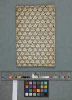 Blue block-printed paper, black and green, used as cover, left side