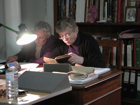 Two Georgian scholars reading thorough a Georgian mss